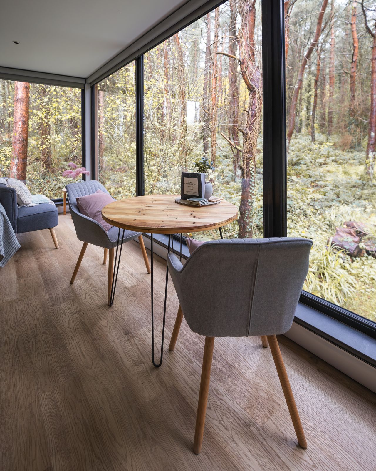Dining table looking out into the pines