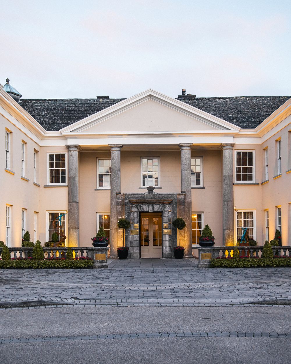 The Castlemartyr Resort manor house facade with columned entrance