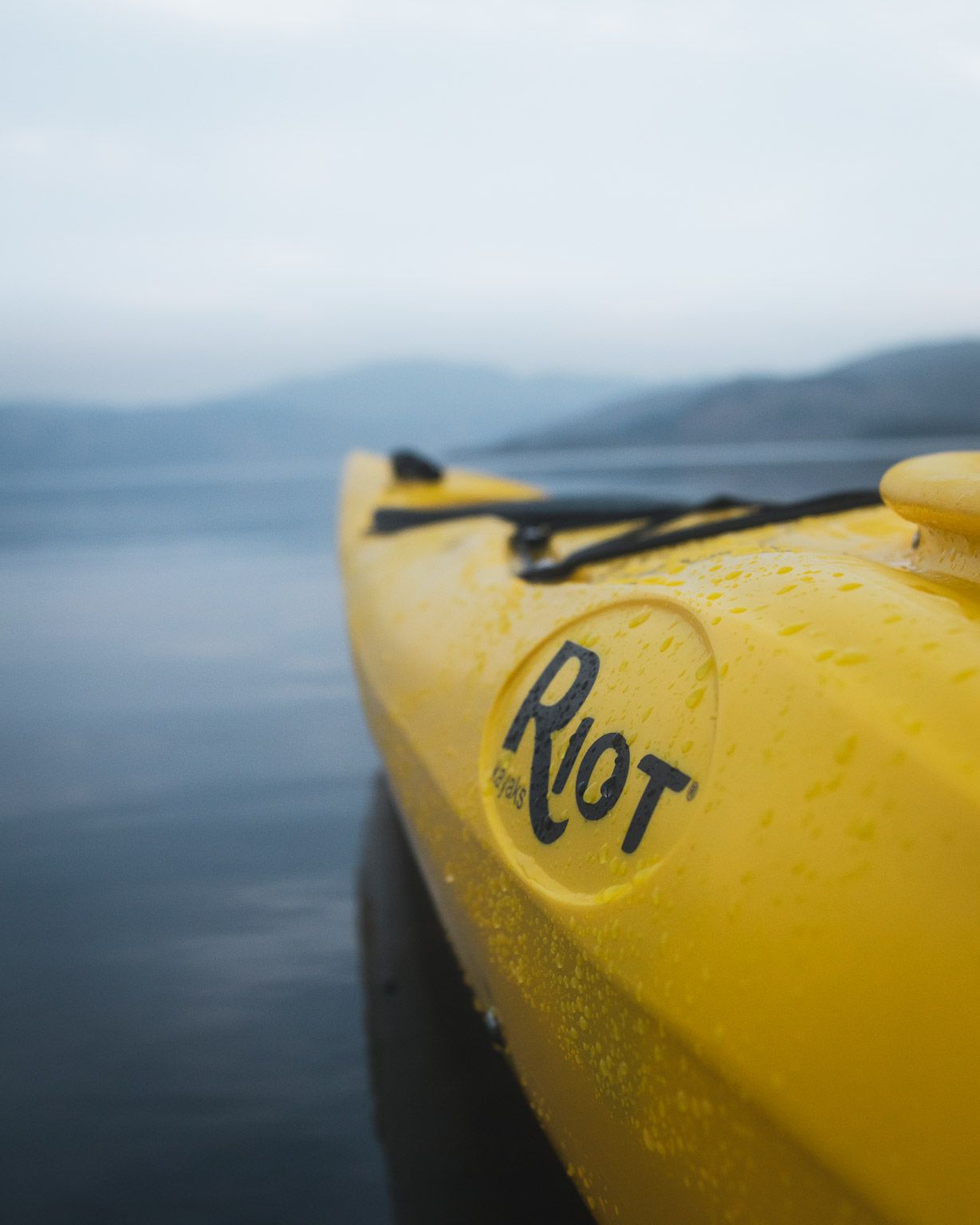 Riot Kayaks kayak on flat water at dawn