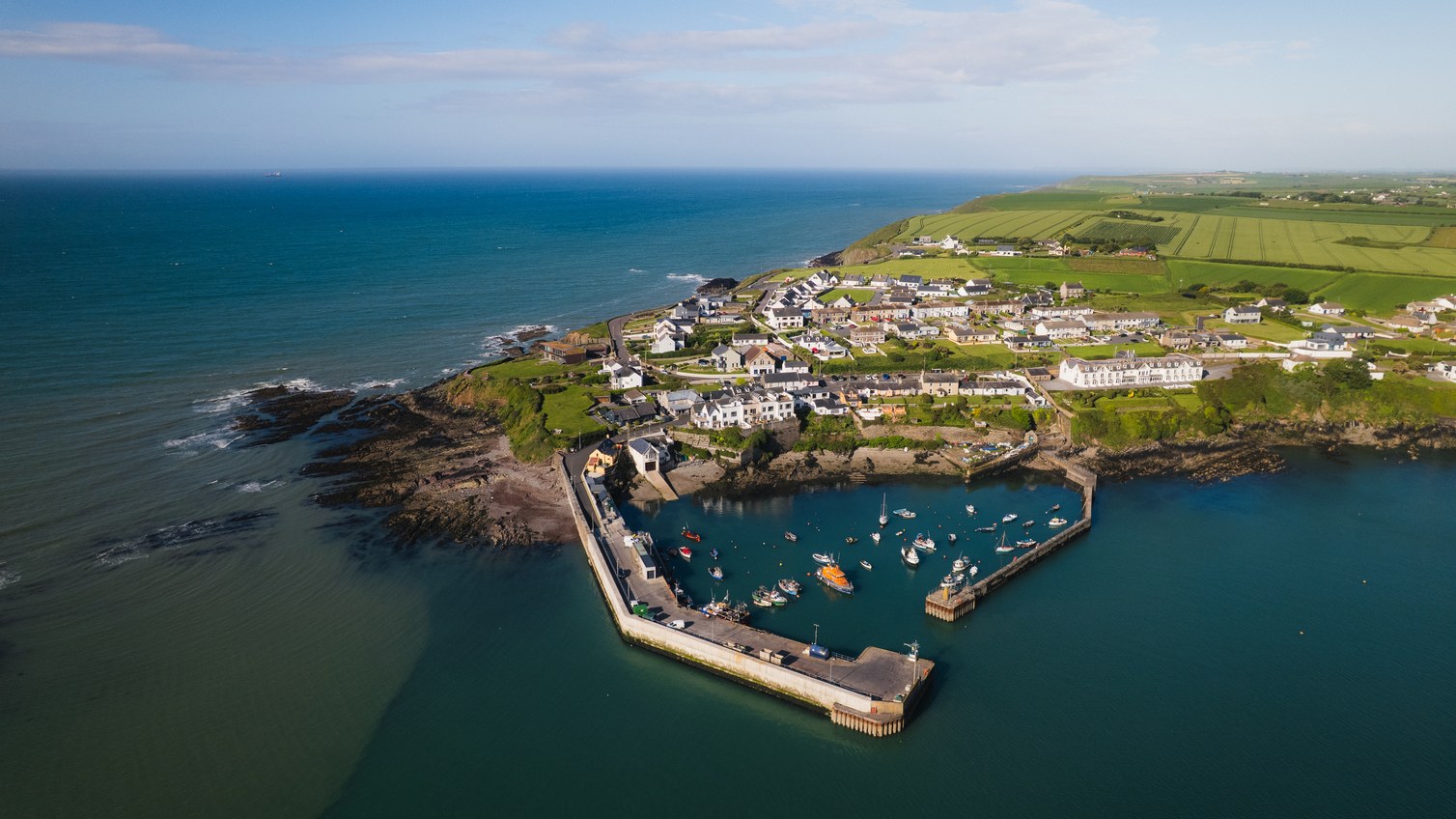 A harbour town on a narrow peninsula, seen from above