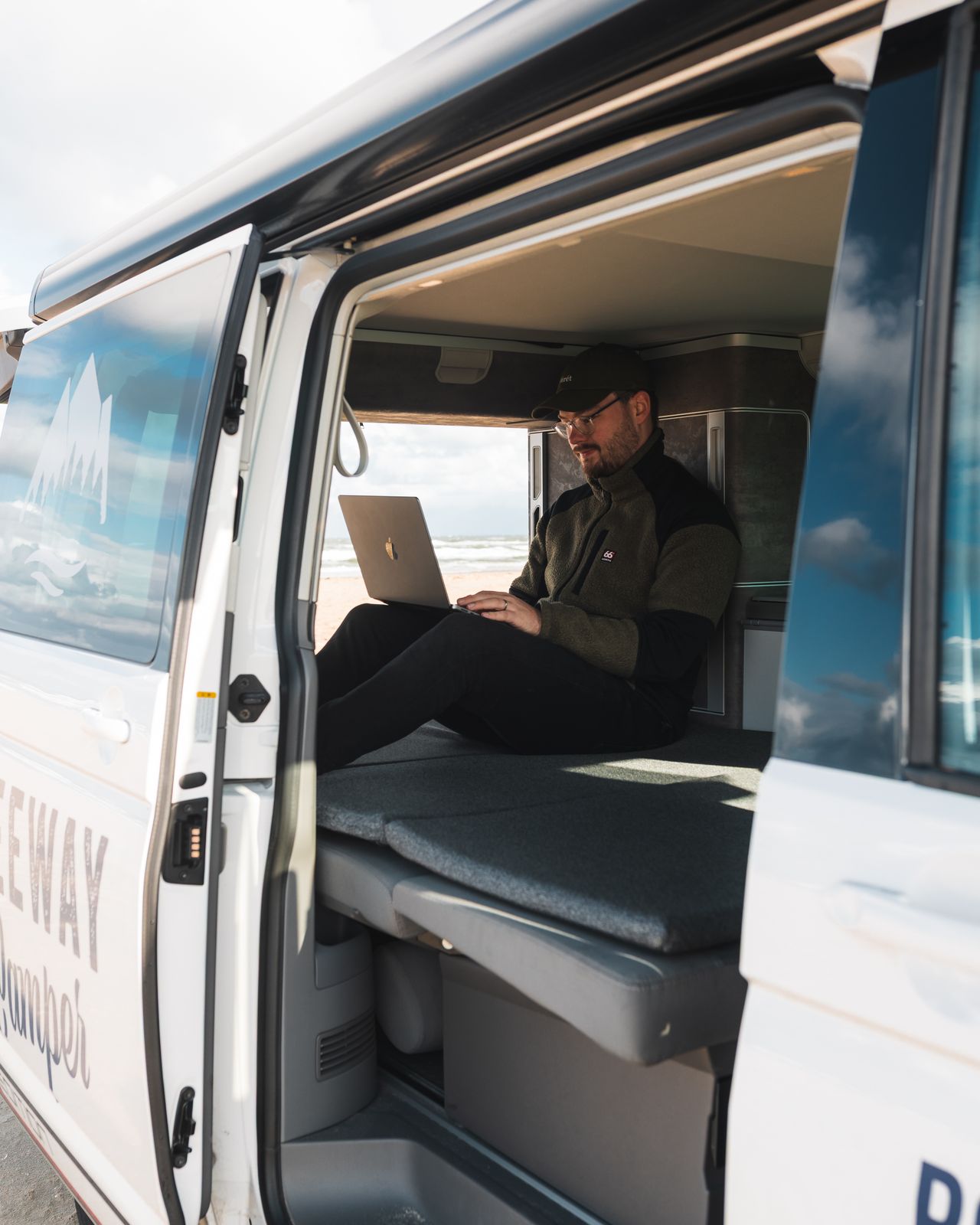 Working inside the van with the side door open
