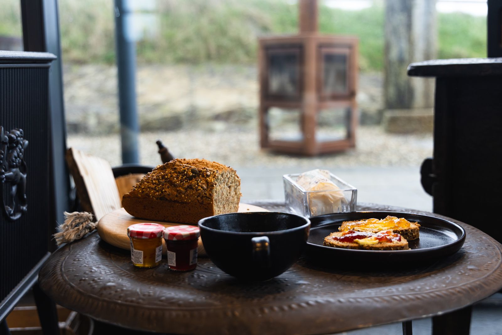 Breakfast laid out on a cast iron table