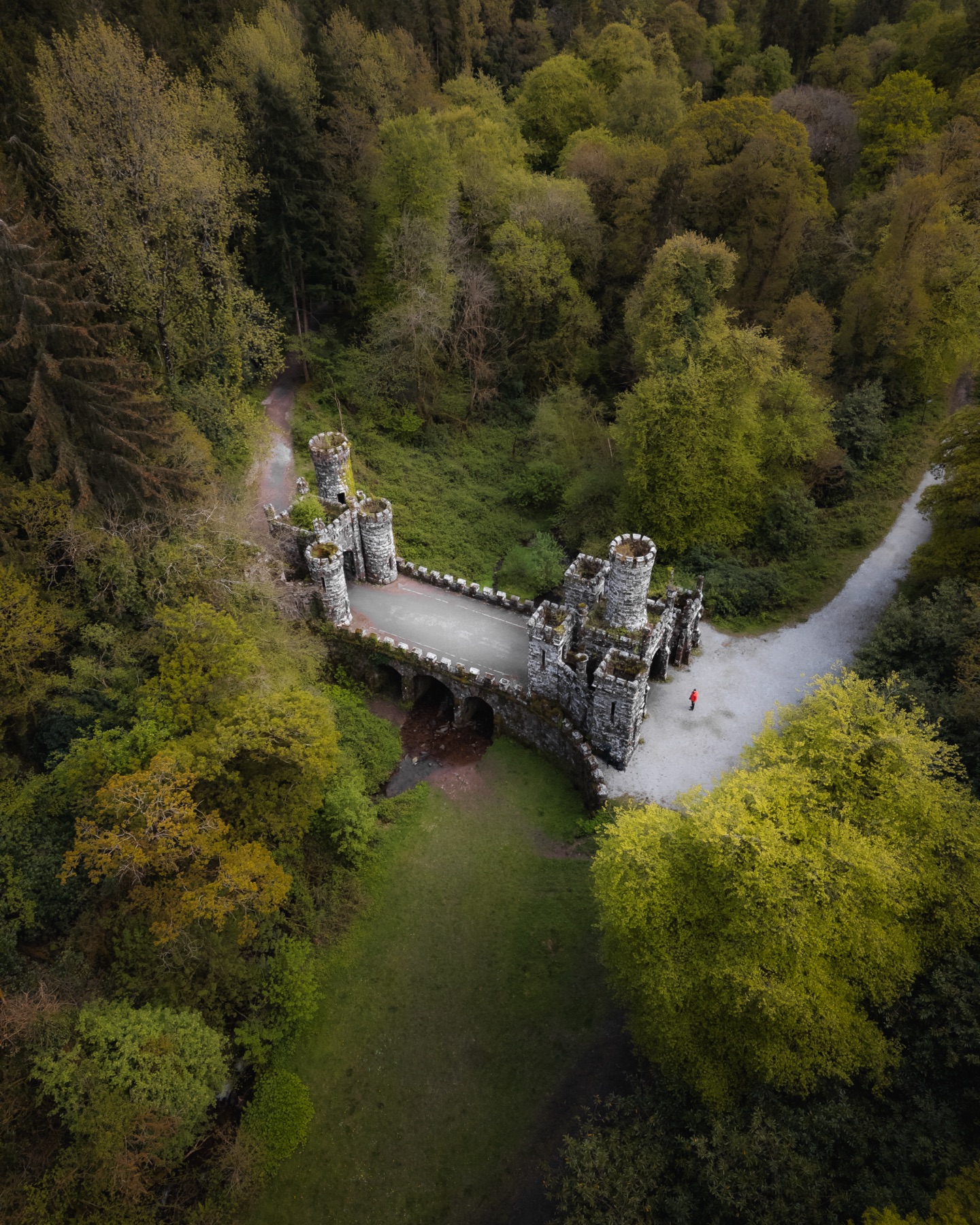 Gothic gate lodge and bridge in woodland at Ballysaggartmore, County Waterford