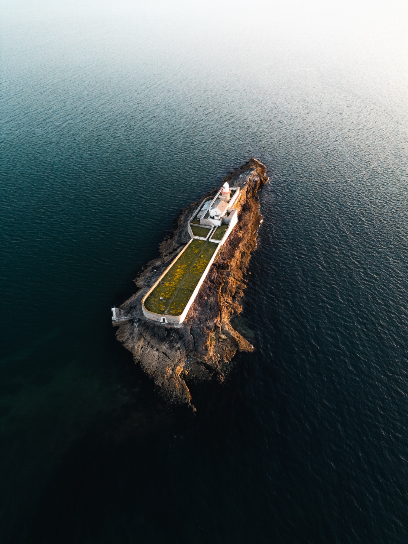 Fenit Lighthouse on Little Samphire Island in Tralee Bay, County Kerry