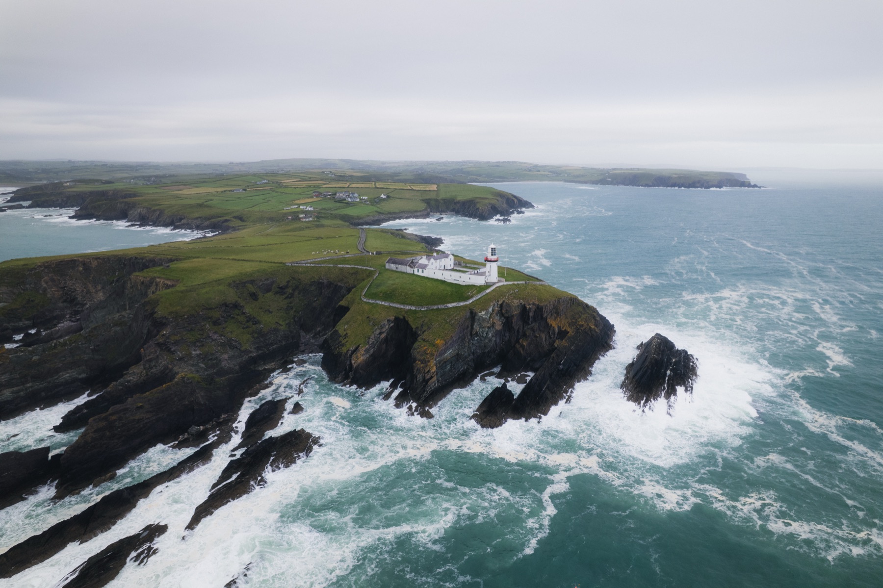 Galley Head Lighthouse on the Dundeady headland reaching into the Atlantic, County Cork
