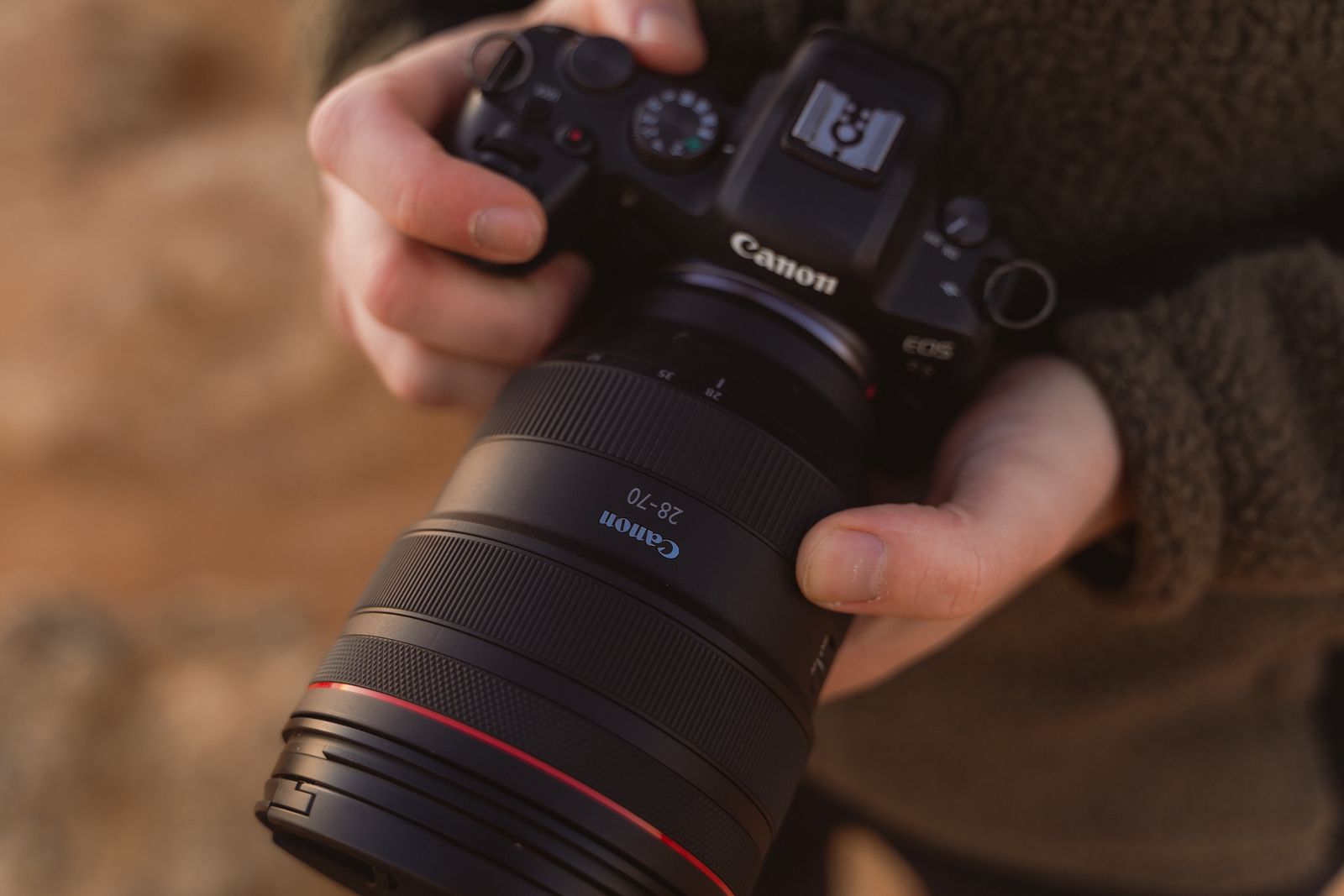 Camera body and lens held up in the field