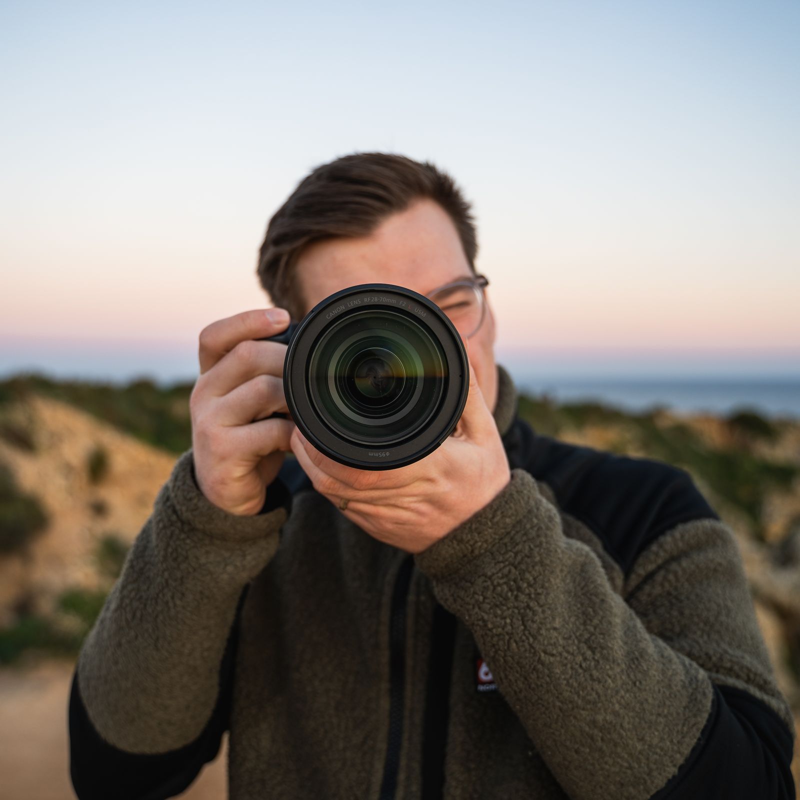 Self portrait shooting with the camera to the eye