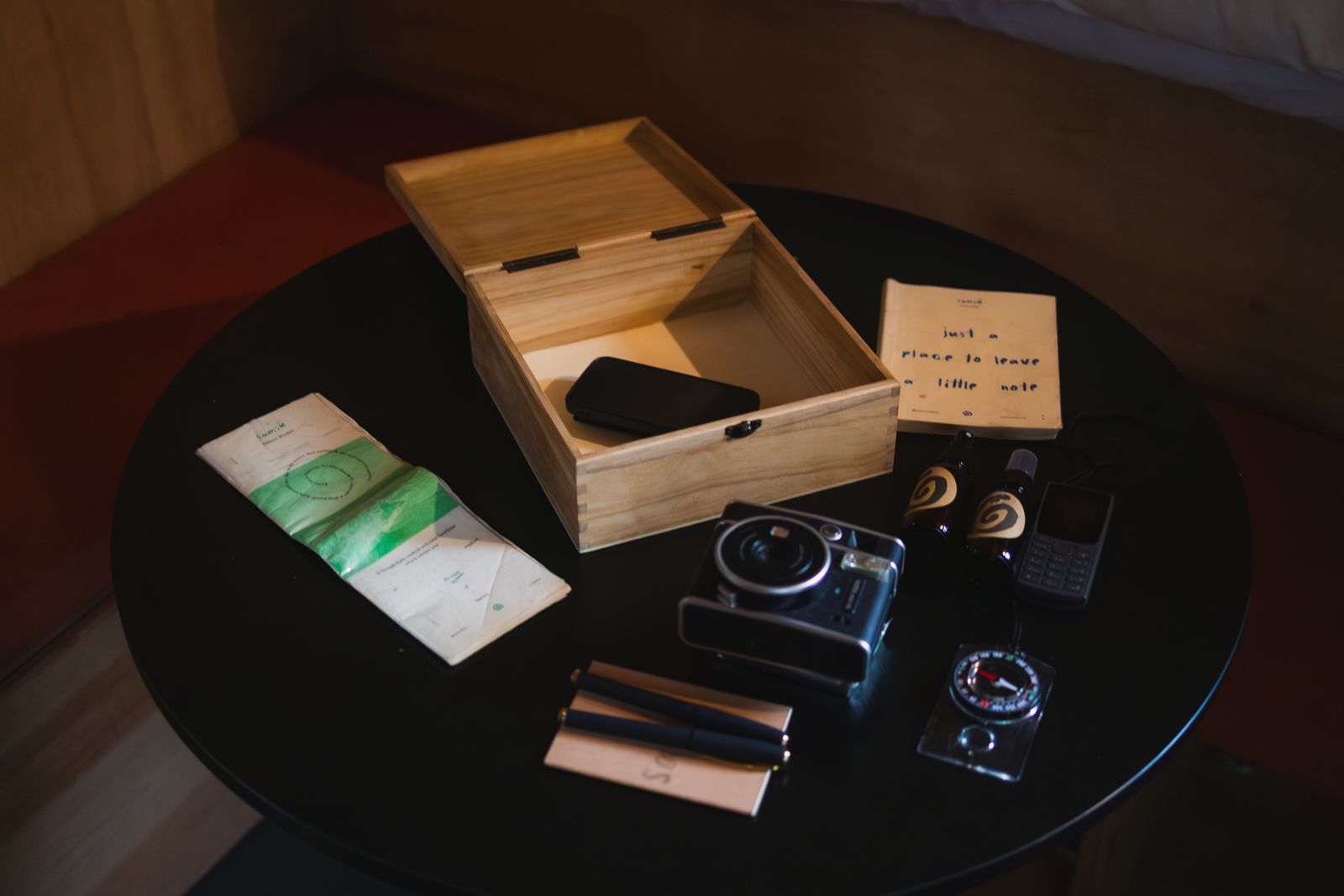 Table set with film, matches and small objects